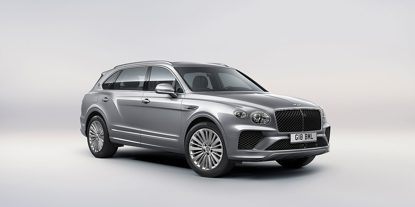 Bentley Kuwait Bentley Bentayga Extended Wheelbase luxury SUV front three quarter view in Moonbeam paint with 21 inch five spoke painted wheels