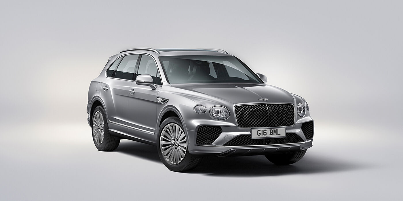 Bentley Kuwait Bentley Bentayga luxury SUV front three quarter view in Moonbeam paint with matrix grille and 21″ 5 spoke painted wheels
