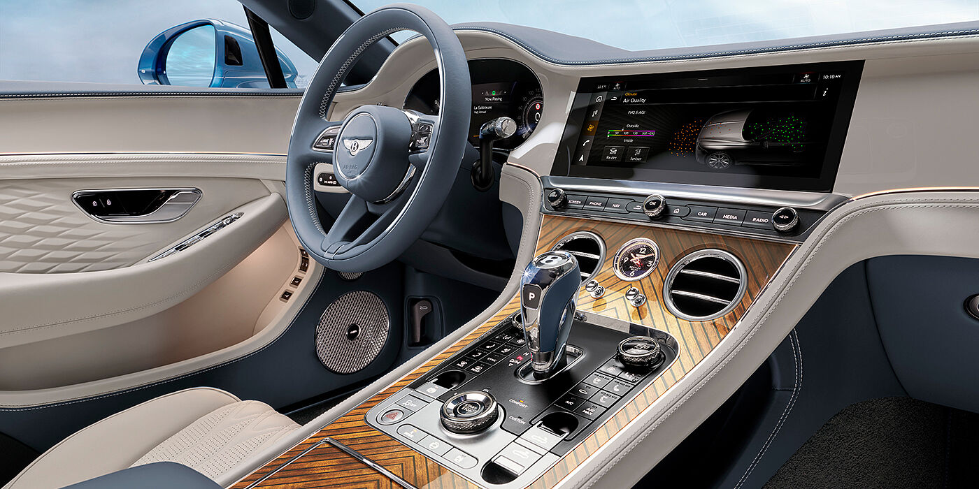 Bentley Kuwait New Bentley Continental GTC Azure convertible interior front cabin view with Linen and Brunel hides and Piano Linen by Mulliner veneer featuring centre console and centre MMI screen