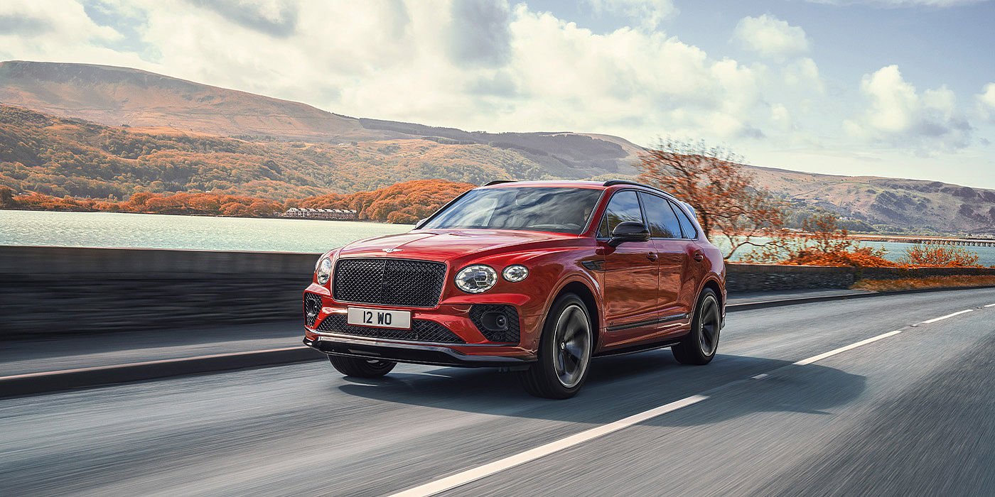 Bentley Kuwait Bentley Bentayga S SUV in Candy Red paint front 34 dynamic