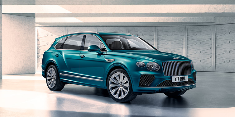 Bentley Kuwait Bentley Bentayga Extended Wheelbase Azure SUV front three quarter in Topaz blue paint colour with a grey background