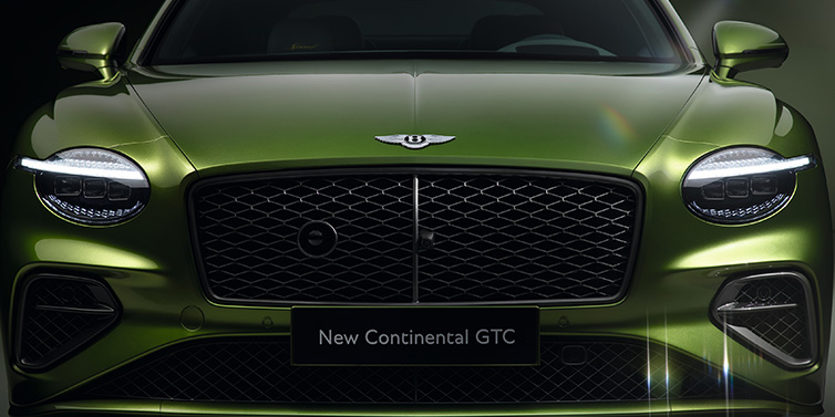 Bentley Kuwait Bentley Continental GTC Speed convertible front bonnet detail in Tourmaline Green paint showing new light design