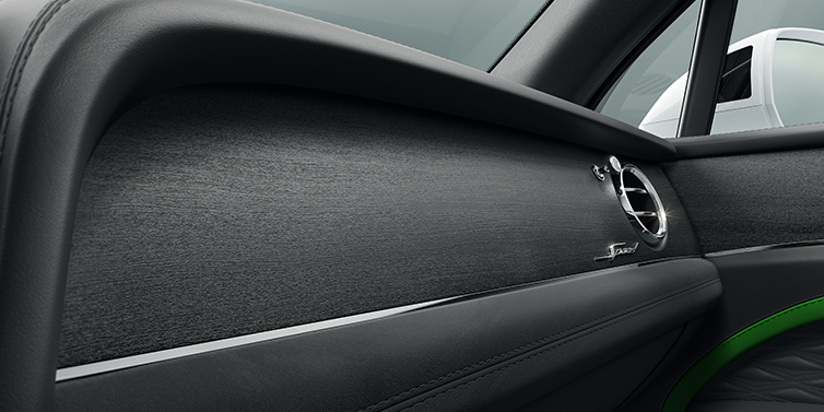 Bentley Kuwait Bentley Bentayga Speed SUV front dash close up in Hyper Green and Beluga black hides, with Black Stained Crown Cut Walnut veneer