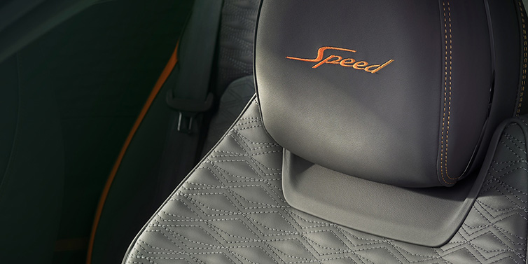 Bentley Kuwait Bentley Continental GT Speed coupe seat detail in Gravity Grey hide and Speed emblem in Mandarin by Mulliner coloured embroidery