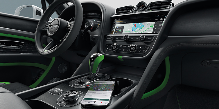 Bentley Kuwait Bentley Bentayga Speed SUV front cabin in Hyper Green and Beluga black hides, with Black Stained Crown Cut Walnut veneer